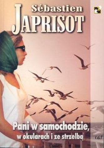 Pani w samochodzie w okularach i ze strzelbą