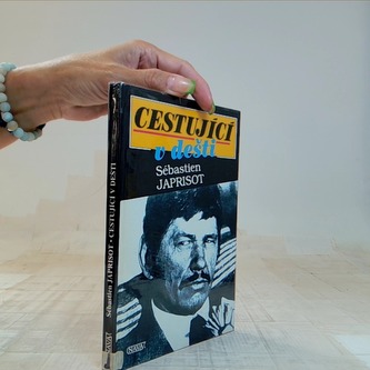 Cestující v dešti