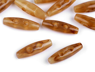 Plastový knoflík oliva 9x31 mm - 200 ks - 1 jantar