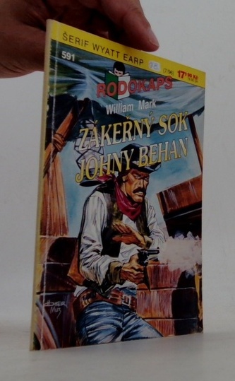 zákeřný sok John Behan