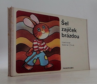 Šel zajíček brázdou