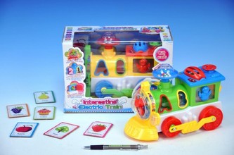 Lokomotiva/Vlak plast 21cm vkládačka s chrastítkem na baterie se světlem se zvukem v krabici