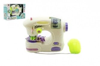 Šicí stroj plast 15cm na baterie se světlem v krabici 26x18x9cm