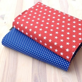 Obal na knihu Hvězdy na červené/puntík střední modrý