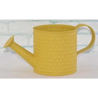 Obal kovový ve žluté barvě - tvar konve.