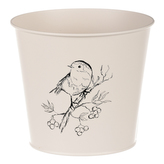 Obal kovový, krémová barva s ptáčkem.