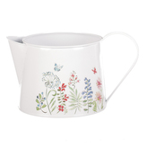 Kovový obal na květiny - tvar konve. Květinový design.