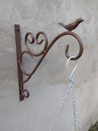 Věšák kovový s ptáčkem