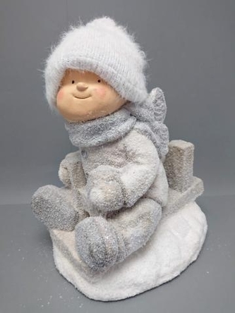 Chlapeček na sáňkách