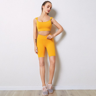 Sportovní set s krátkými legínami a kapsami, žlutá S