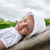 Dětský klobouk Mušelín trojlístek; Barva: bílá; Velikost: L